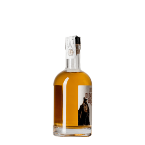 Bottiglia lato sinistro di Genziana in Barrique 350 ml liquore artigianale dal gusto intenso e pregiato della genziana, affinato con cura in rovere per un'esperienza unica.